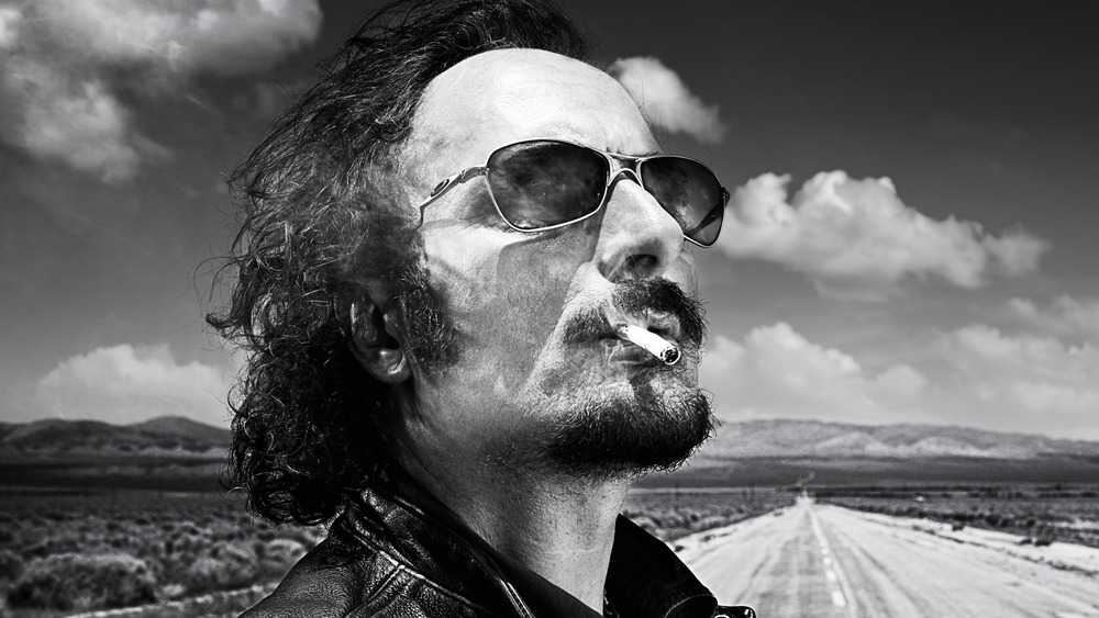 Kim Coates smoking a cigarette