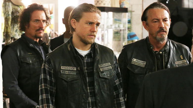 Tig, Jax, and Chibs standing in store