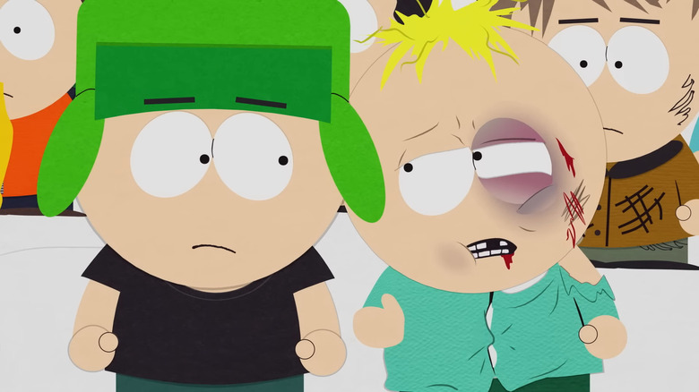 Kyle talking to a bruised up Butters