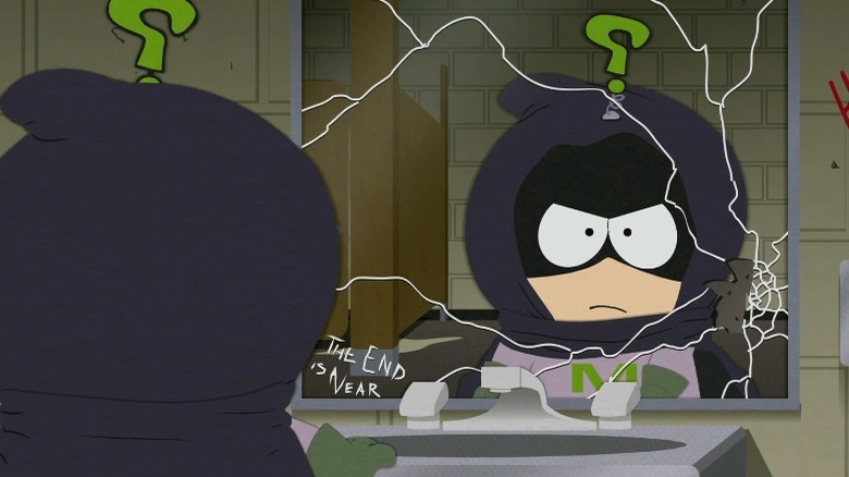 Mysterion looking in a mirror