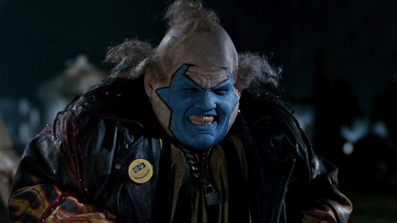 John Leguizamo as Violator smiling