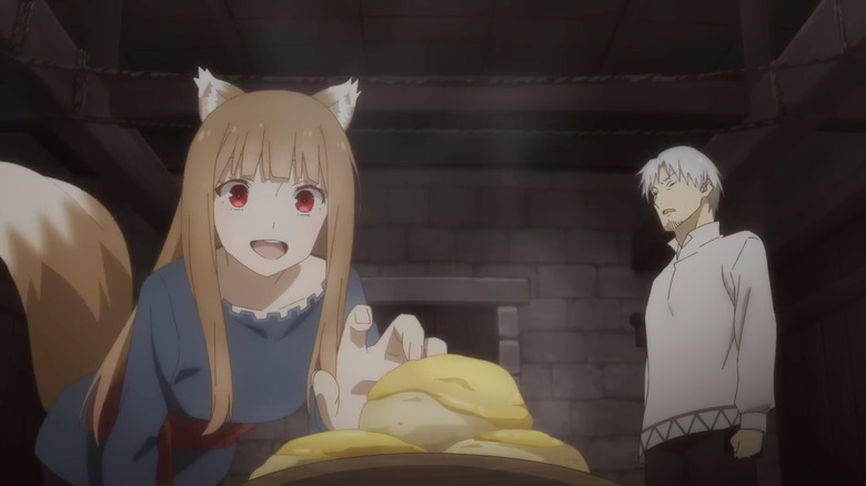 Holo reaching for food