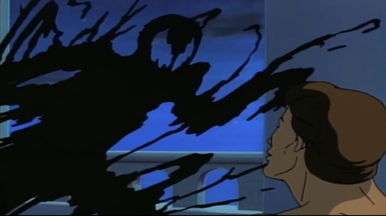 The Symbiote looms over Peter Parker