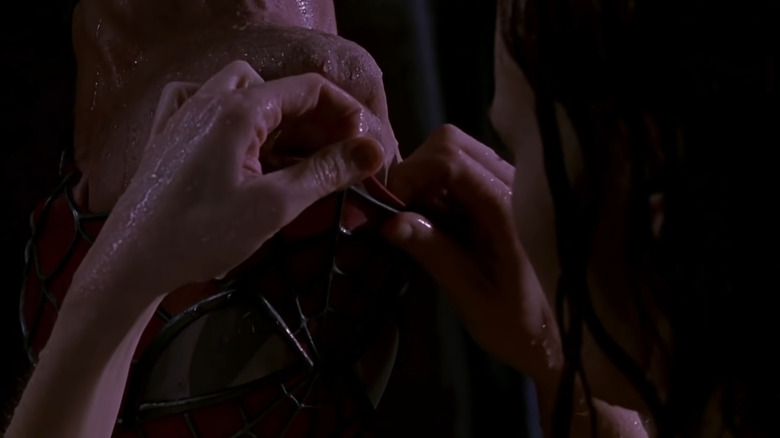 Mary Jane Watson unrolls Spider-Man's mask