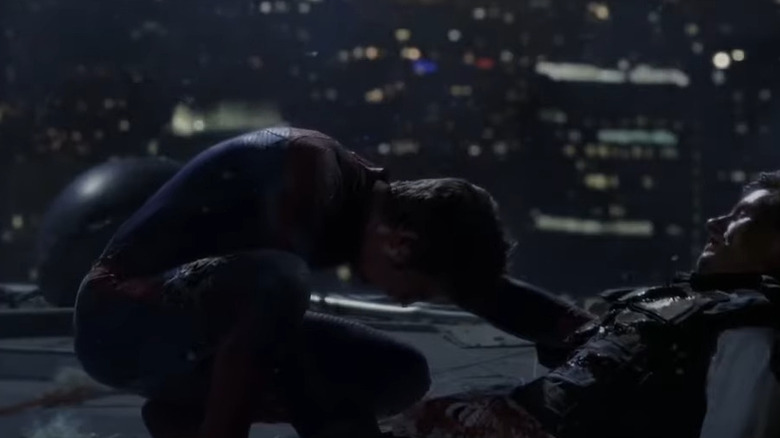 Spider-Man kneels over the body of Captain Stacy