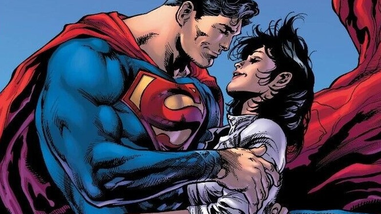 Superman holding Lois Lane