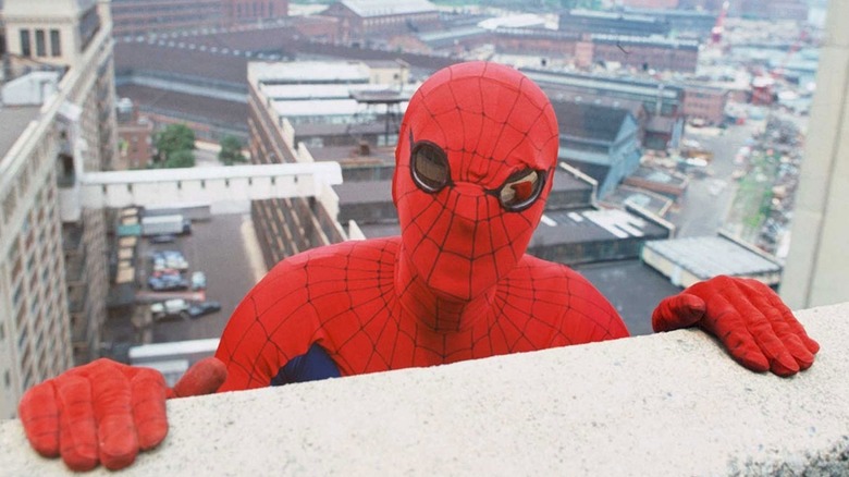 Spider-Man climbs a building