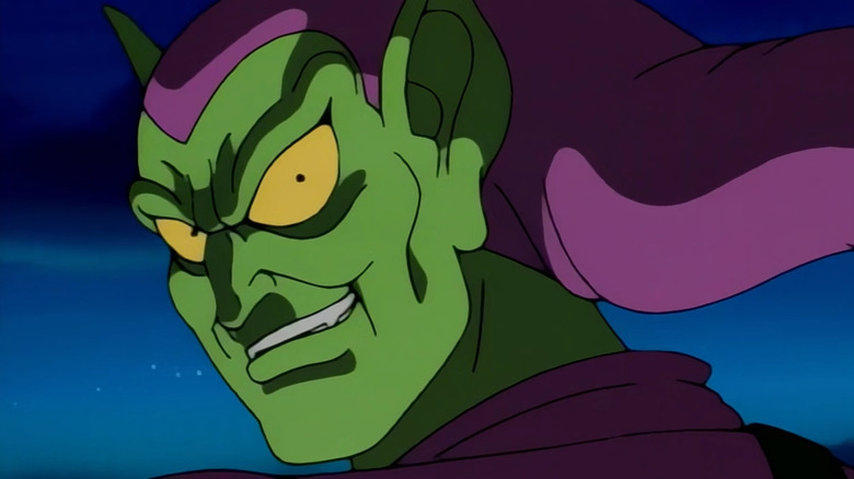 Animated Green Goblin sneering over shoulder