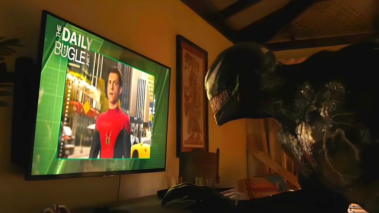 Venom watching Spider-Man on TV