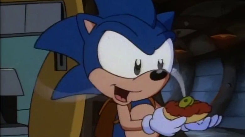 Sonic holds a chili dog