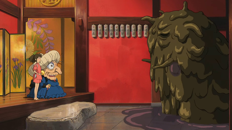 Chihiro and Yubaba looking disgusted at a stink spirit