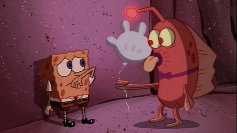 An anglerfish giving SpongeBob a glove balloon