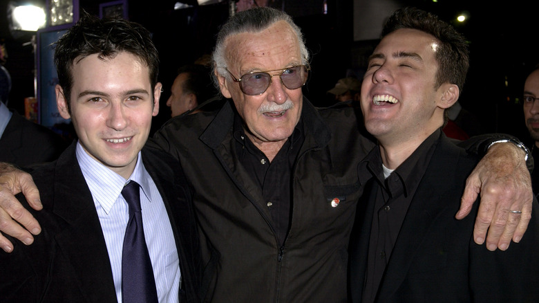 Dan Harris and Michael Dougherty laughing with Stan Lee