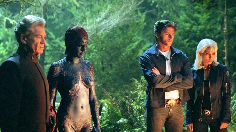 Magneto, Mystique, Wolverine, and Storm in forest