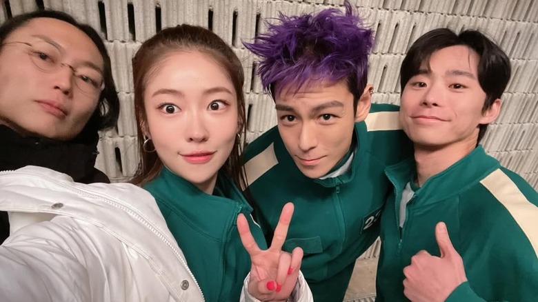 Song Ji-woo taking a selfie with Choi Seung-hyun on the set of Squid Game Season 2