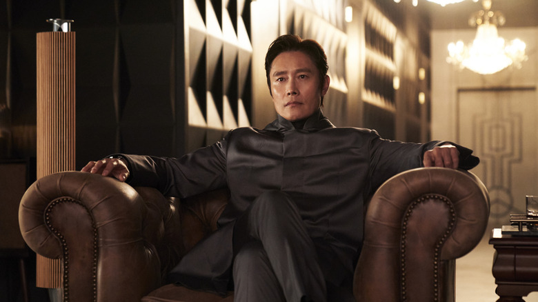 Lee Byung-hun as Hwang In-ho, sitting in his private office on Squid Game