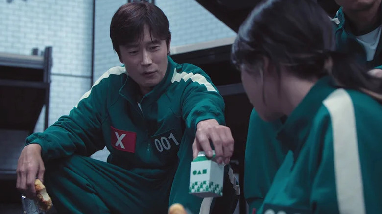 Hwang In-ho offers his milk to Jun-hee on "Squid Game" Season 2 (2024)