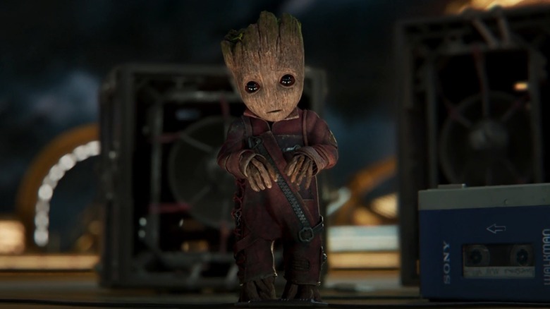 Baby Groot sets up speakers