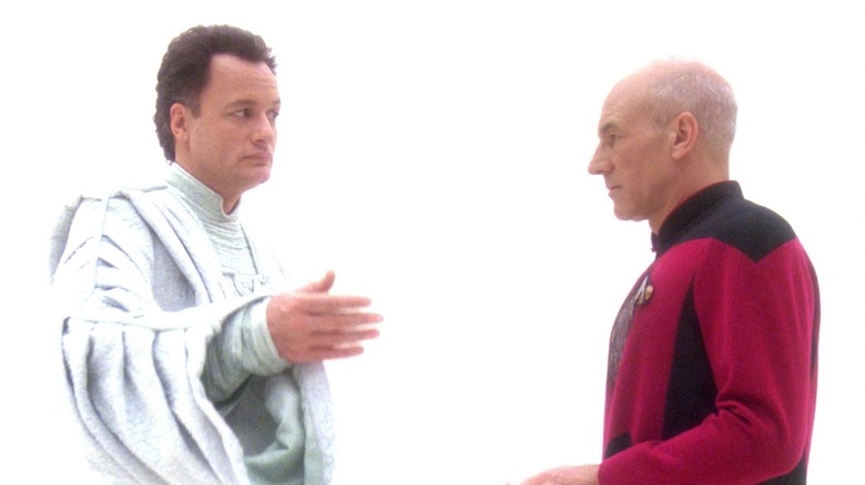 Picard speaks with Q in a white void