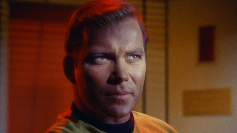 Captain Kirk with a strong light across his eyes