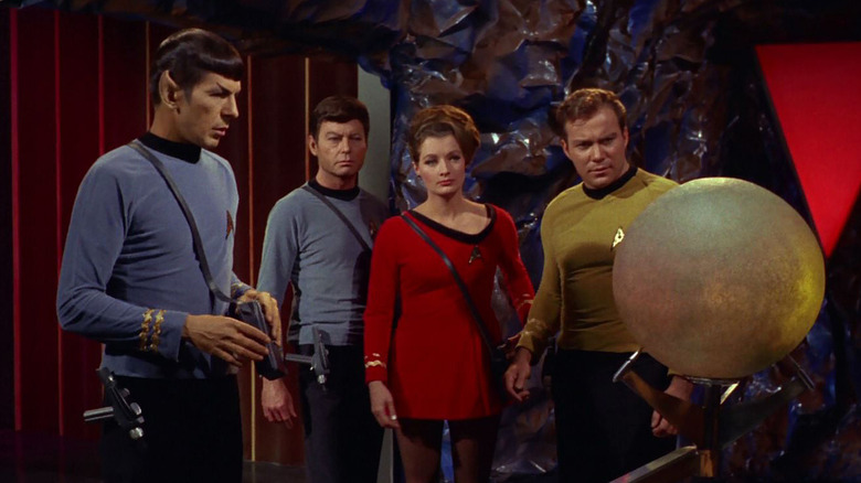 Spock, McCoy, Mulhall, and Kirk with Sargon's sphere