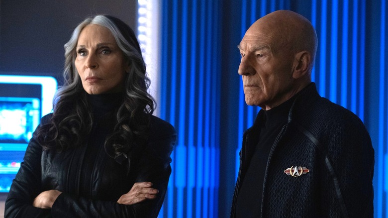 Beverly and Picard standing next to each other