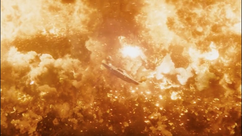 Enterprise surrounded by explosions