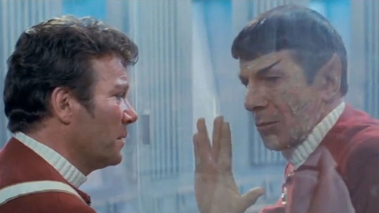 Spock giving "Live Long and Prosper" hand gesture to Kirk