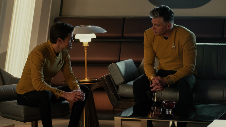 Captains Kirk and Pike talking