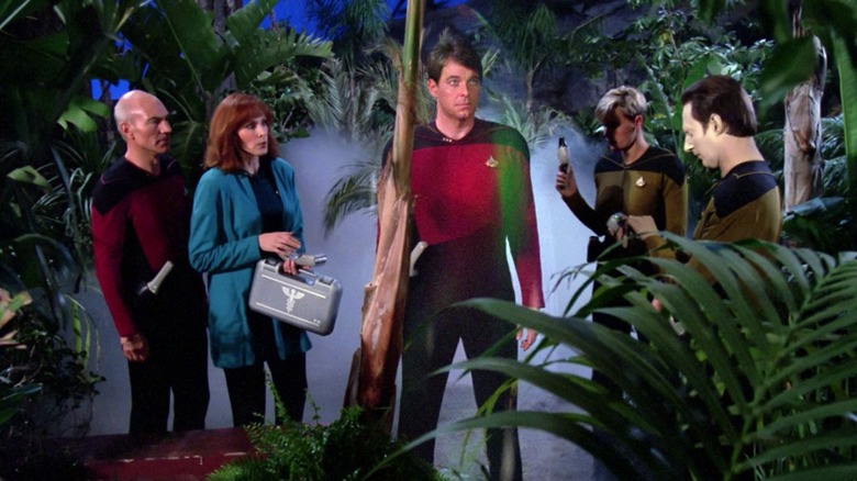 The Enterprise crew in a bad jungle set