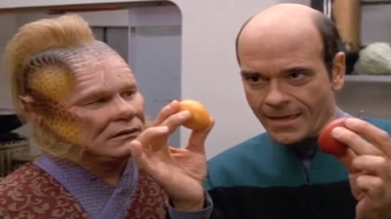 Neelix and Doctor comparing fruits