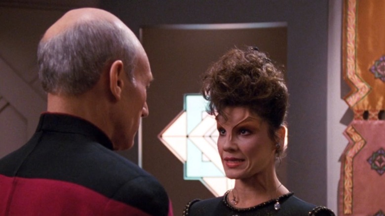 Ardra talking with Jean Luc Picard