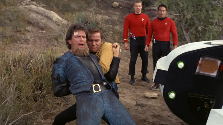 Captain Kirk apprehending Lazarus