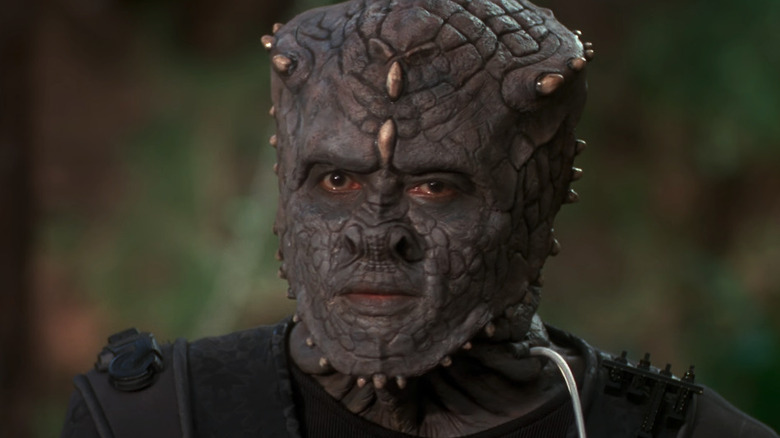 A Jem'Hadar soldier looks off-screen