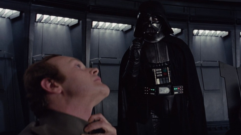 Darth Vader force-choking an officer