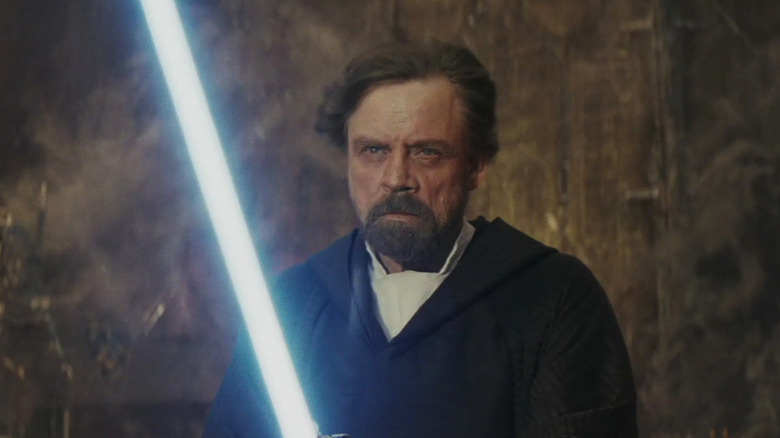 Luke Skywalker igniting his lightsaber