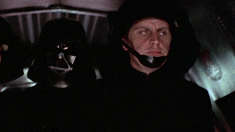 Harry Fielder as an Imperial officer in front of Darth Vader