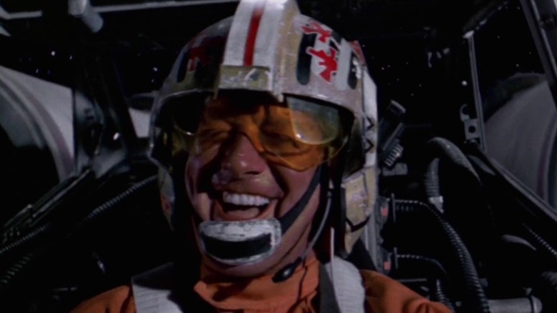 A rebel pilot cheers in his fighter in "Star Wars" (1977)