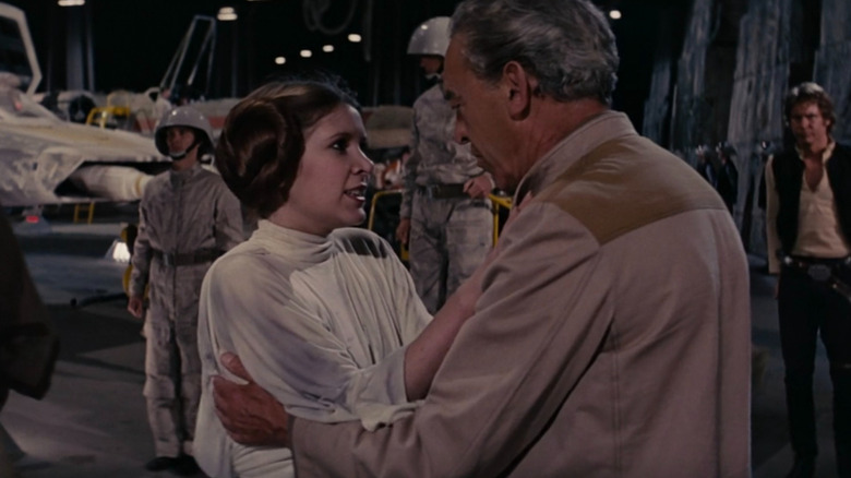 Commander Willard embraces Princess Leia in "Star Wars" (1977)