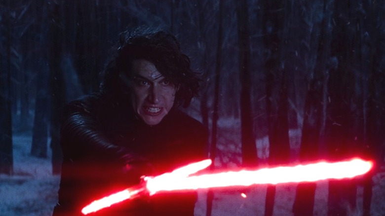 Kylo Ren holding lightsaber out