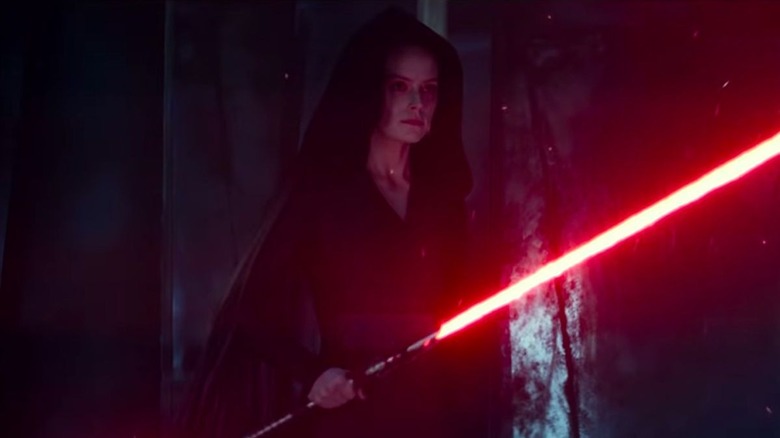 Dark Rey wielding lightsaber