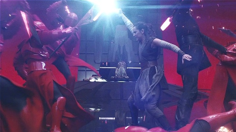 Kylo and Rey battle the guards