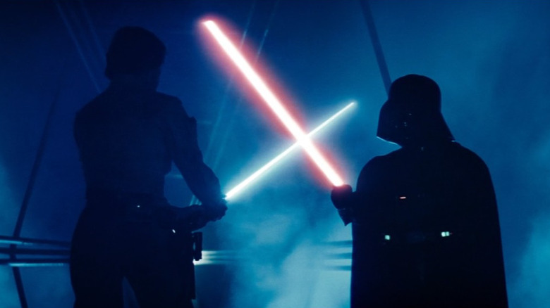 Luke and Darth Vader crossing swords