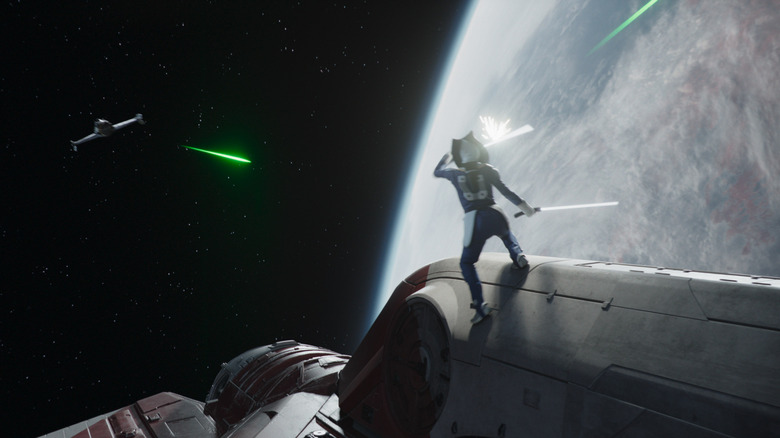 Ahsoka deflecting enemy fire in space