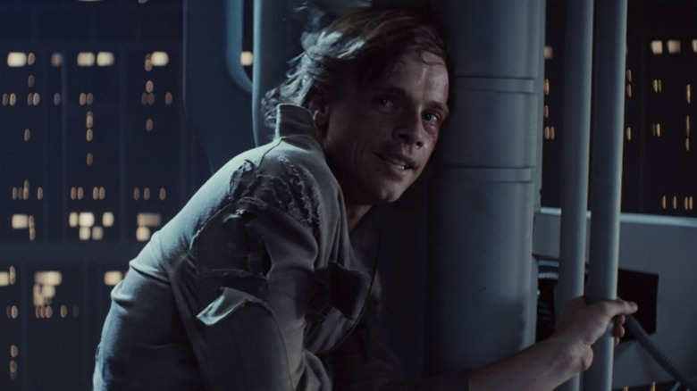 Luke Skywalker leaning against pole