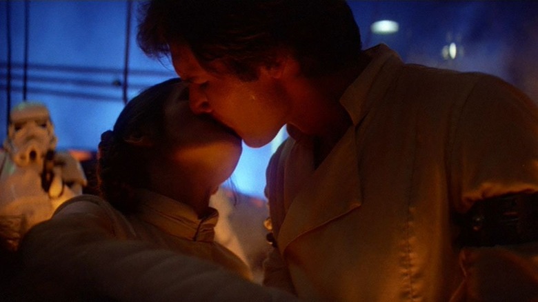 Leia and Han kiss before he is frozen in carbonite in Empire Strikes Back.