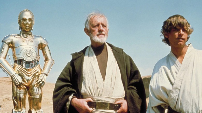 C-3PO, Kenobi, and Luke Skywalker 