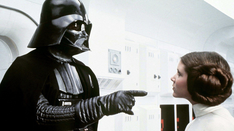 Darth Vader captures Princess Leia Organa in Star Wars (1977)