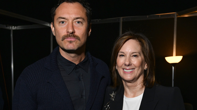 Jude Law and Kathleen Kennedy smiling