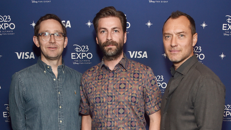 Christopher Ford, Jon Watts, and Jude Law smiling